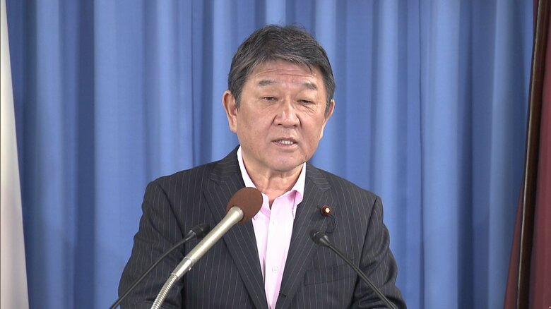 会見する茂木幹事長