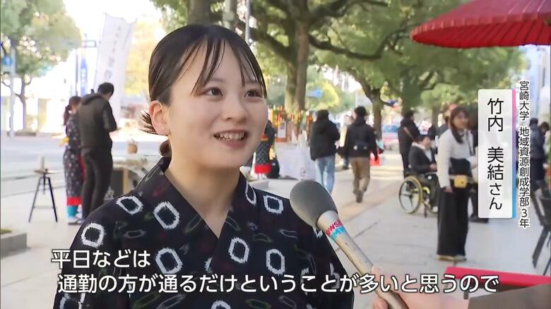 インタビューを受ける学生