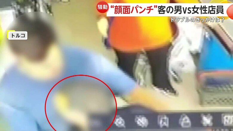 間に入った見かねた男性