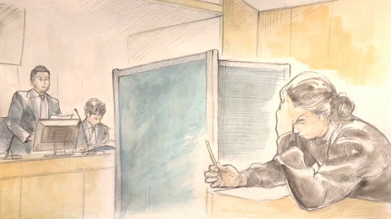 山上被告の妹に対する検察側証人尋問時の法廷　妹はついたての中で話した