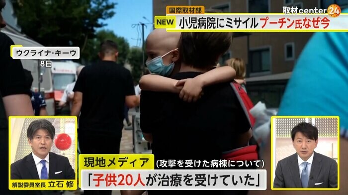 小児病棟から避難する子ども