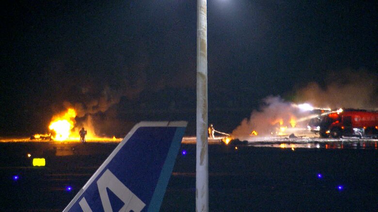 羽田空港で炎上する日航機