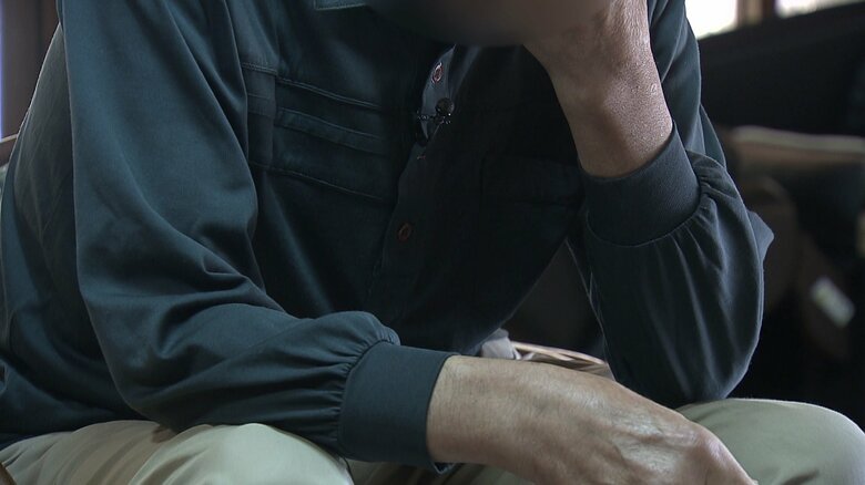 被害の実態を話すオガワさん（仮名）