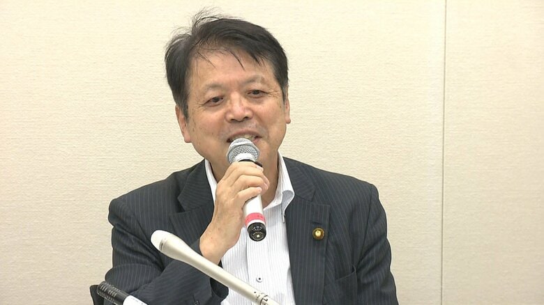 幹事長の平岡秀夫氏