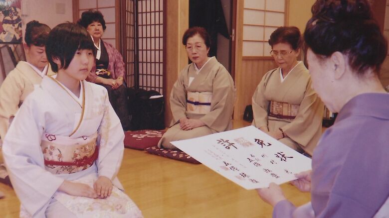 待子さんから指導を受ける淑豊さん（提供：遺族）