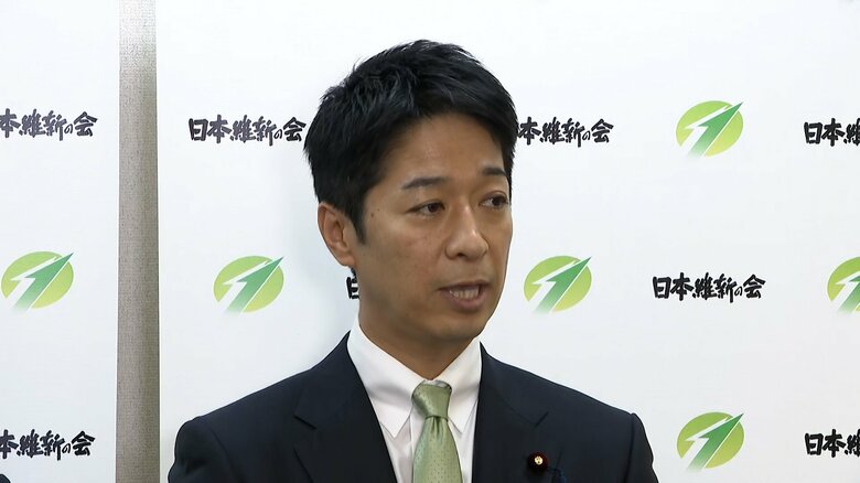 役員会終了後、記者団の取材に応じた藤田共同代表