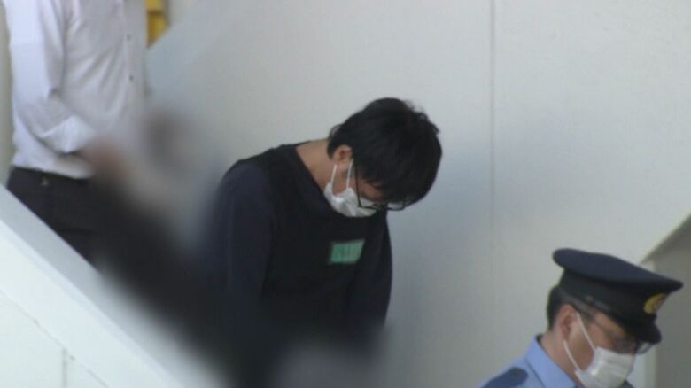 身柄を送られる柘野容疑者