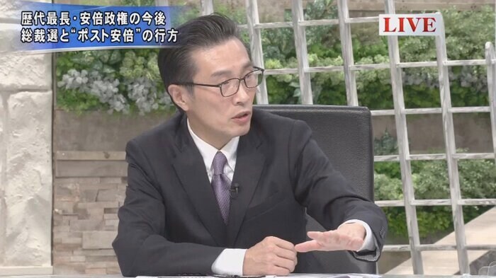 柿﨑明二 共同通信社論説・編集委員
