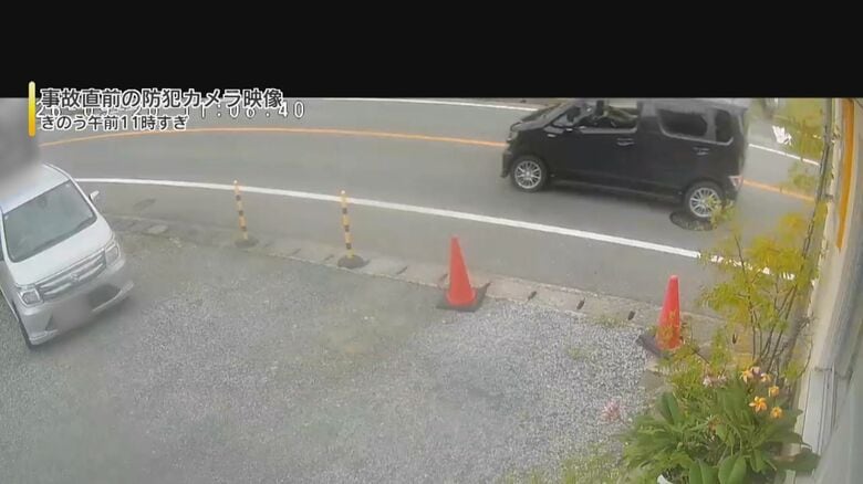 かなりのスピードで通り過ぎる軽自動車(福岡市西区･9月20日)